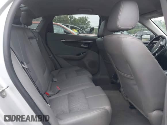 2018 Chevrolet Impala LT with VIN 1G1105SA1JU131478, listed as a IAAI auction lot 42341889 with 201,328 mi miles and . Bid and sale history available at DreamBid. Image 8.