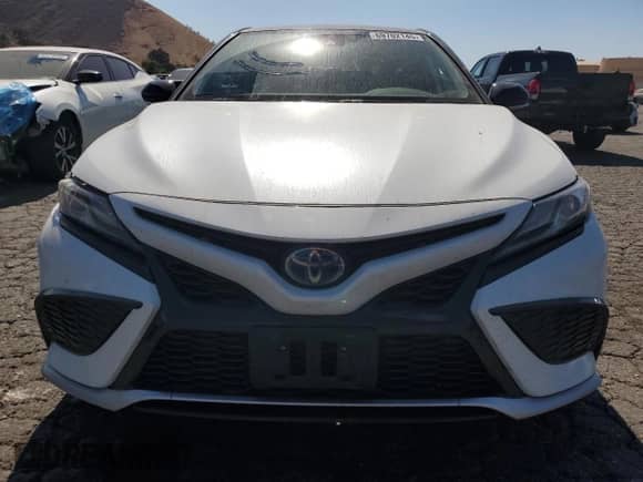 2021 Toyota Camry Hybrid XSE with VIN 4T1K31AK4MU028027, listed as a Copart auction lot 69702145 with 84,116 mi miles and Salvage title. Bid and sale history available at DreamBid. Image 5.