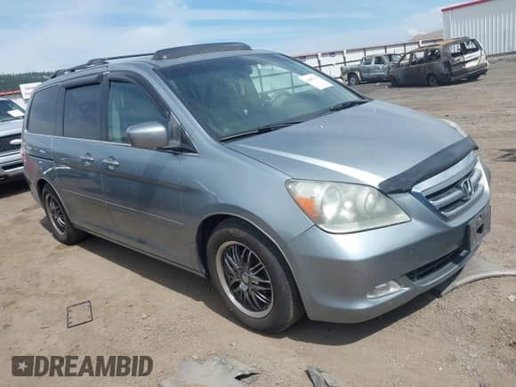 2006 Honda Odyssey Touring with VIN 5FNRL38886B123453, listed as a IAAI auction lot 42887110 with 179,905 mi miles and . Bid and sale history available at DreamBid. Image 1.