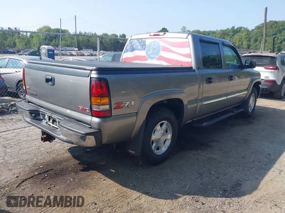 2006 GMC Sierra 1500 SLT with VIN 2GTEK13Z261326086, listed as a IAAI auction lot 42958079 with 144,604 mi miles and . Bid and sale history available at DreamBid. Image 4.