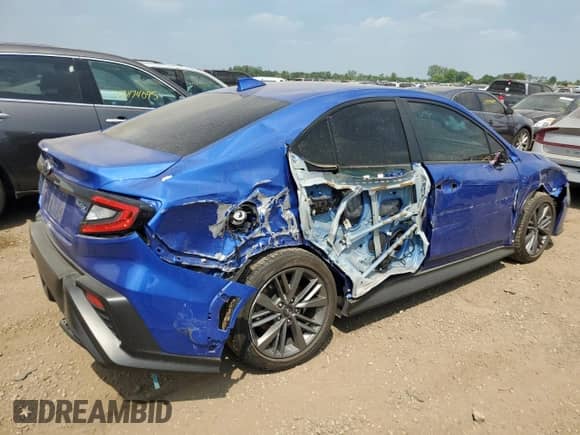 2023 Subaru WRX with VIN JF1VBAA62P9814493, listed as a Copart auction lot 65750005 with 10,004 mi miles and Salvage title. Bid and sale history available at DreamBid. Image 3.