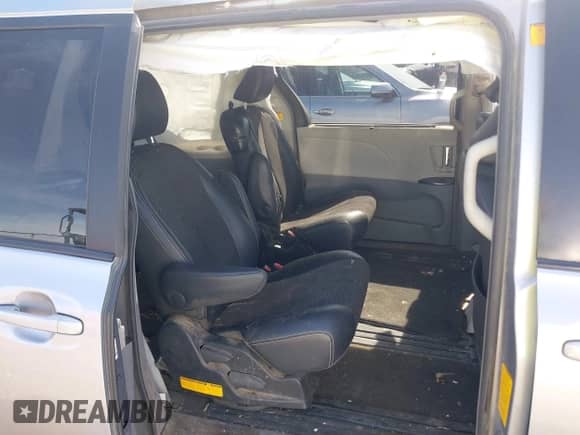 2012 Toyota Sienna SE with VIN 5TDXK3DC7CS258273, listed as a IAAI auction lot 42444615 with Not provided miles and . Bid and sale history available at DreamBid. Image 8.