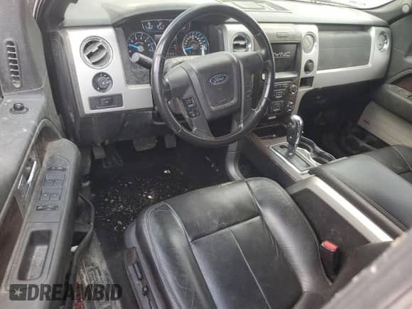 2013 Ford F-150 Lariat with VIN 1FTFW1ET7DKF18182, listed as a Copart auction lot 68183995 with 165,863 mi miles and Salvage title. Bid and sale history available at DreamBid. Image 8.