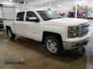2015 Chevrolet Silverado 1500 LT with VIN 3GCUKREC3FG273148, listed as a Copart auction lot 68478805 with 191,939 mi miles and Salvage title. Bid and sale history available at DreamBid. Image 4.