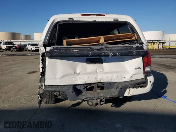 2016 Toyota Tacoma TRD Sport with VIN 3TMBZ5DN9GM001172, listed as a Copart auction lot 86475475 with 92,598 mi miles and Salvage title. Bid and sale history available at DreamBid. Image 6.