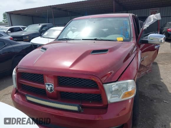 2012 Ram 1500 Express z VIN 1C6RD7FT1CS318554, wystawiony jako IAAI lot #42063789 z przebiegiem Nie podano mil oraz . Historia ofert i sprzedaży dostępna na DreamBid. Obrazek 13.