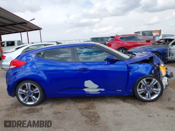 2012 Hyundai Veloster w/Black Int с VIN KMHTC6AD8CU067589, выставлен на аукционе IAAI как лот 43408833 с пробегом 159 802 миль миль и . История ставок и продаж доступна на DreamBid. Изображение 13.