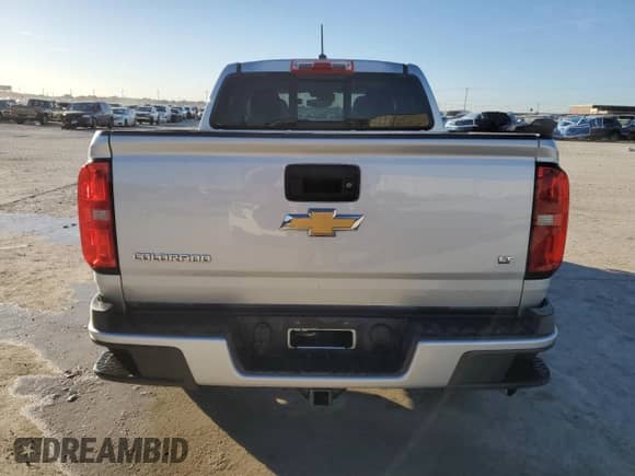 2018 Chevrolet Colorado 4WD LT with VIN 1GCPTCE19J1211265, listed as a Copart auction lot 83497354 with 71,111 mi miles and Salvage title. Bid and sale history available at DreamBid. Image 6.
