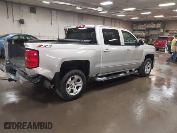 2018 Chevrolet Silverado 1500 LT с VIN 3GCUKRECXJG492648, выставлен на аукционе IAAI как лот 42419524 с пробегом 124 277 миль миль и . История ставок и продаж доступна на DreamBid. Изображение 4.