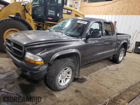 2003 Dodge Dakota Sport с VIN 1D7HG38N43S369703, выставлен на аукционе Copart как лот 79664404 с пробегом 225 257 миль миль и Списание • Salvage title. История ставок и продаж доступна на DreamBid. Изображение 1.