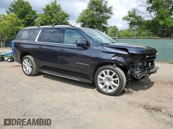 2023 Chevrolet Suburban High Country with VIN 1GNSKGKL4PR318428, listed as a Copart auction lot 65628925 with 37,751 mi miles and Salvage title. Bid and sale history available at DreamBid. Image 4.
