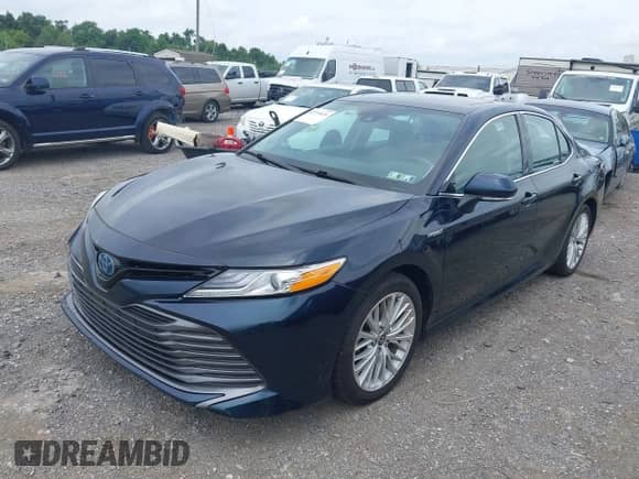 2020 Toyota Camry Hybrid XLE with VIN 4T1F31AK4LU544811, listed as a IAAI auction lot 42755426 with 80,230 mi miles and . Bid and sale history available at DreamBid. Image 2.
