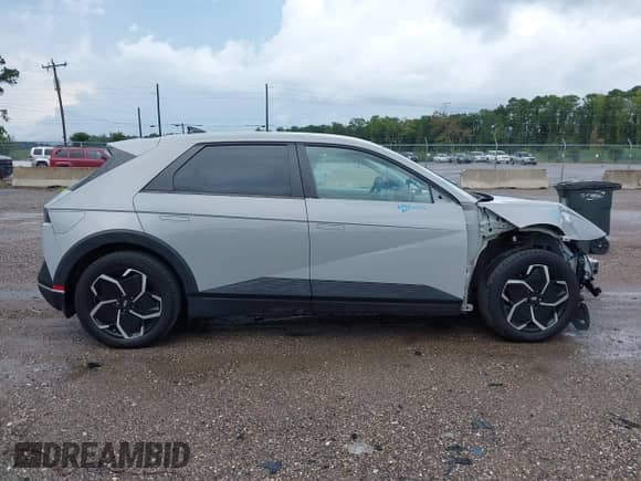 2022 Hyundai Ioniq 5 SEL with VIN KM8KN4AE9NU080809, listed as a IAAI auction lot 42830290 with 28,501 mi miles and . Bid and sale history available at DreamBid. Image 13.