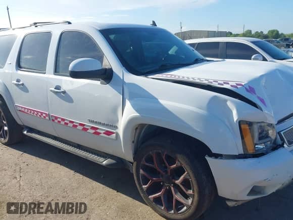 2010 Chevrolet Suburban LT z VIN 1GNUCJE04AR145330, wystawiony jako IAAI lot #42579675 z przebiegiem 185 242 mil mil oraz . Historia ofert i sprzedaży dostępna na DreamBid. Obrazek 1.