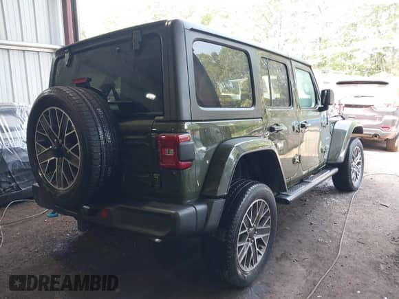 2023 Jeep Wrangler Sahara with VIN 1C4JJXP61PW683614, listed as a IAAI auction lot 42421826 with 18,890 mi miles and . Bid and sale history available at DreamBid. Image 4.