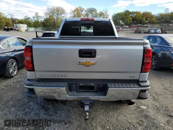 2018 Chevrolet Silverado 2500HD LTZ с VIN 1GC1KWEG0JF162748, выставлен на аукционе Copart как лот 70771524 с пробегом Не указан миль и Списание • Salvage title. История ставок и продаж доступна на DreamBid. Изображение 6.