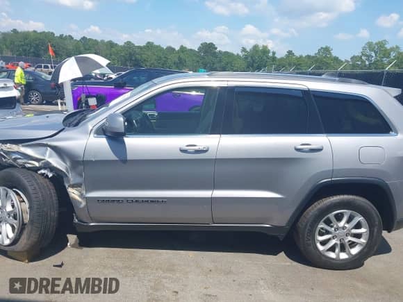 2021 Jeep Grand Cherokee Laredo E с VIN 1C4RJFAG3MC853824, выставлен на аукционе IAAI как лот 42518563 с пробегом 95 357 миль миль и . История ставок и продаж доступна на DreamBid. Изображение 14.