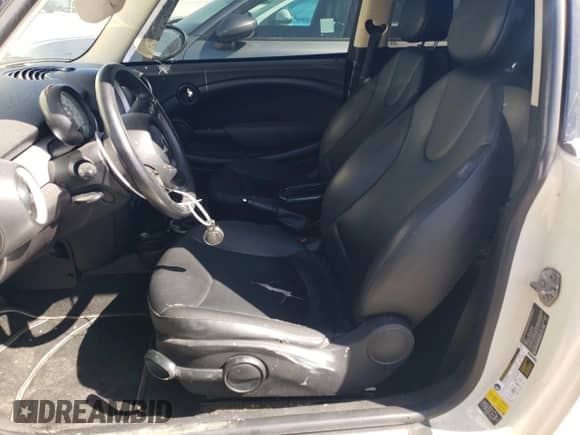 2013 MINI Hardtop with VIN WMWSU3C51DT691076, listed as a Copart auction lot 48066455 with 143,002 mi miles and Salvage title. Bid and sale history available at DreamBid. Image 7.