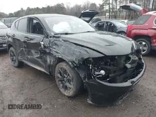 2023 Dodge Hornet GT Plus z VIN ZACNDFBN6P3A00392, wystawiony jako IAAI lot #41561105 z przebiegiem 15 566 mil mil oraz . Historia ofert i sprzedaży dostępna na DreamBid. Obrazek 1.