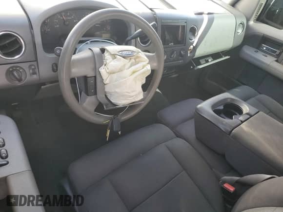 2005 Ford F-150 STX with VIN 1FTRX12W65NA19284, listed as a Copart auction lot 71751235 with Not provided miles and Salvage title. Bid and sale history available at DreamBid. Image 8.