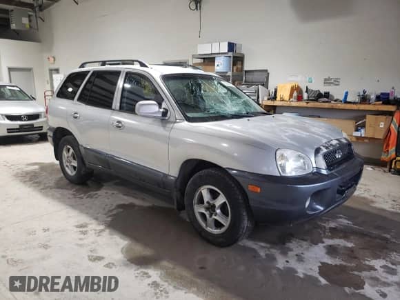 2001 Hyundai Santa Fe GLS с VIN KM8SC83D81U104738, выставлен на аукционе Copart как лот 85650284 с пробегом 215 619 миль миль и Списание • Salvage title. История ставок и продаж доступна на DreamBid. Изображение 4.
