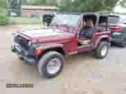 1998 Jeep Wrangler SE with VIN 1J4FY29PXWP794854, listed as a IAAI auction lot 42929258 with 235,517 mi miles and . Bid and sale history available at DreamBid. Image 2.