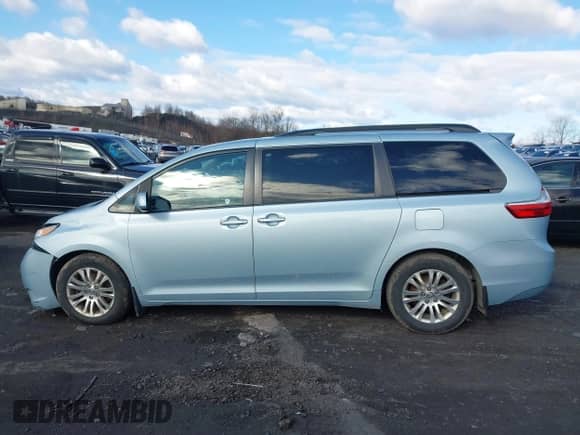 2016 Toyota Sienna XLE with VIN 5TDYK3DC9GS758610, listed as a IAAI auction lot 41722763 with 144,649 mi miles and . Bid and sale history available at DreamBid. Image 14.