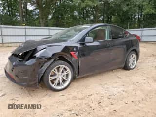 2021 Tesla Model Y Long Range с VIN 5YJYGDEE5MF158576, выставлен на аукционе Copart как лот 70321745 с пробегом Не указан миль и Списание • Salvage title. История ставок и продаж доступна на DreamBid. Изображение 1.