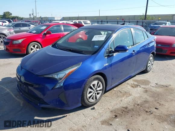 2018 Toyota Prius Two z VIN JTDKBRFU8J3585914, wystawiony jako IAAI lot #43308661 z przebiegiem 58 103 mil mil oraz . Historia ofert i sprzedaży dostępna na DreamBid. Obrazek 2.