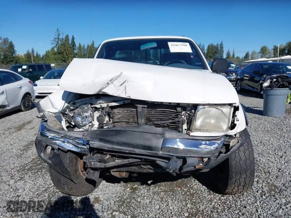 2000 Toyota Tacoma with VIN 5TEWM72N9YZ709411, listed as a IAAI auction lot 43417590 with 249,085 mi miles and . Bid and sale history available at DreamBid. Image 13.