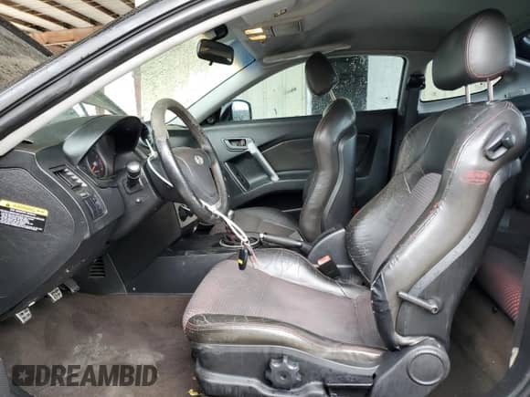 2005 Hyundai Tiburon GT с VIN KMHHN65F55U175179, выставлен на аукционе Copart как лот 89319685 с пробегом 220 117 миль миль и Чистый • Clean title. История ставок и продаж доступна на DreamBid. Изображение 7.