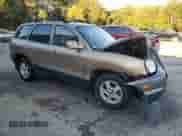 2002 Hyundai Santa Fe GLS z VIN KM8SC13D42U209396, wystawiony jako Copart lot #75453254 z przebiegiem 177 708 mil mil oraz Szkoda całkowita • Salvage title. Historia ofert i sprzedaży dostępna na DreamBid. Obrazek 4.