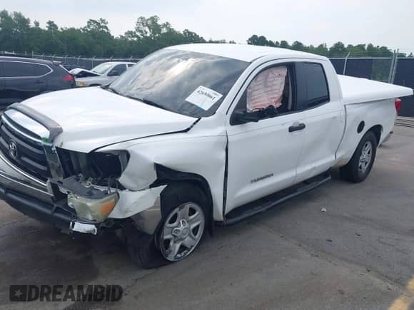 2012 Toyota Tundra z VIN 5TFRU5F17CX027958, wystawiony jako IAAI lot #42690061 z przebiegiem 228 438 mil mil oraz . Historia ofert i sprzedaży dostępna na DreamBid. Obrazek 17.