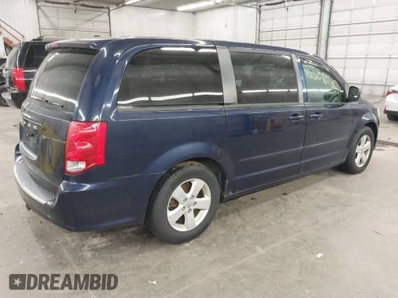 2014 Dodge Grand Caravan SE with VIN 2C4RDGBG8ER100018, listed as a IAAI auction lot 43506142 with 224,863 mi miles and . Bid and sale history available at DreamBid. Image 4.