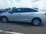 2018 Chevrolet Cruze LS z VIN 1G1BC5SM0J7140578, wystawiony jako IAAI lot #42994459 z przebiegiem 84 860 mil mil oraz . Historia ofert i sprzedaży dostępna na DreamBid. Obrazek 14.