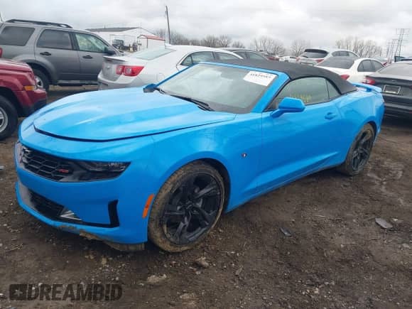 2023 Chevrolet Camaro 1LT with VIN 1G1FB3DX7P0125884, listed as a IAAI auction lot 41829589 with 5,700 mi miles and . Bid and sale history available at DreamBid. Image 2.