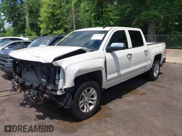 2014 Chevrolet Silverado 1500 LTZ with VIN 3GCUKSEC3EG312519, listed as a IAAI auction lot 42248191 with 141,707 mi miles and . Bid and sale history available at DreamBid. Image 18.