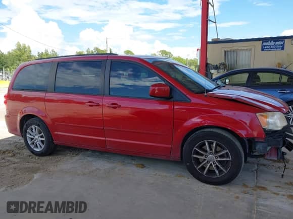 2014 Dodge Grand Caravan SXT with VIN 2C4RDGCG4ER129711, listed as a IAAI auction lot 43317873 with 164,242 mi miles and . Bid and sale history available at DreamBid. Image 13.
