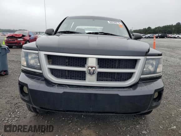 2009 Dodge Dakota Bighorn/Lonestar z VIN 1D7HW38P69S774233, wystawiony jako Copart lot #68258815 z przebiegiem 163 677 mil mil oraz Szkoda całkowita • Salvage title. Historia ofert i sprzedaży dostępna na DreamBid. Obrazek 5.