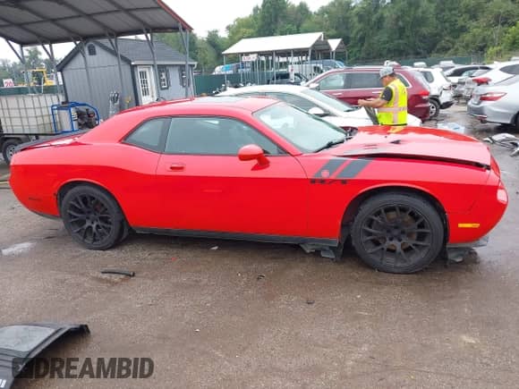 2009 Dodge Challenger R/T z VIN 2B3LJ54T09H563037, wystawiony jako IAAI lot #43288315 z przebiegiem 190 806 mil mil oraz . Historia ofert i sprzedaży dostępna na DreamBid. Obrazek 14.