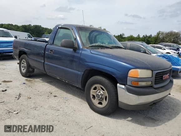 2001 GMC Sierra 1500 SL with VIN 1GTEC14W51Z330120, listed as a Copart auction lot 54144825 with 238,946 mi miles and Clean title. Bid and sale history available at DreamBid. Image 4.