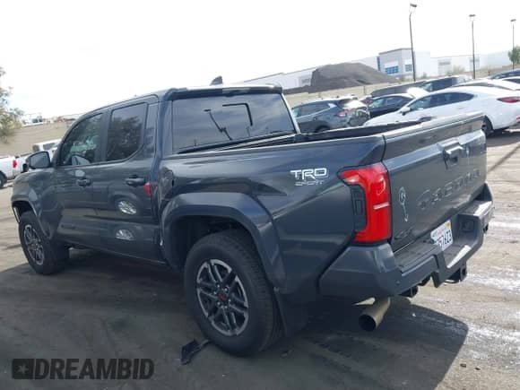 2024 Toyota Tacoma SR5 with VIN 3TMLB5JN5RM051339, listed as a IAAI auction lot 41241754 with 7,181 mi miles and . Bid and sale history available at DreamBid. Image 15.