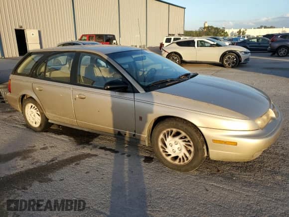1998 Saturn SW с VIN 1G8ZK8271WZ220109, выставлен на аукционе Copart как лот 76509884 с пробегом Не указан миль и На запчасти • Non repairable. История ставок и продаж доступна на DreamBid. Изображение 4.