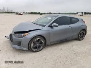 2019 Hyundai Veloster Turbo R-Spec z VIN KMHTH6AB6KU019572, wystawiony jako Copart lot #53870105 z przebiegiem 59 534 mil mil oraz Szkoda całkowita • Salvage title. Historia ofert i sprzedaży dostępna na DreamBid. Obrazek 1.