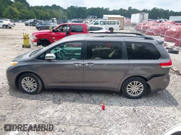 2012 Toyota Sienna XLE AAS with VIN 5TDYK3DC3CS218373, listed as a IAAI auction lot 43035982 with 155,533 mi miles and . Bid and sale history available at DreamBid. Image 14.