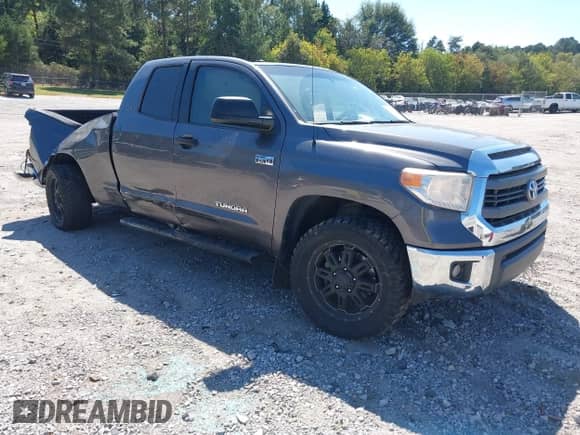 2015 Toyota Tundra SR z VIN 5TFUW5F17FX479045, wystawiony jako IAAI lot #43363287 z przebiegiem 212 178 mil mil oraz . Historia ofert i sprzedaży dostępna na DreamBid. Obrazek 1.