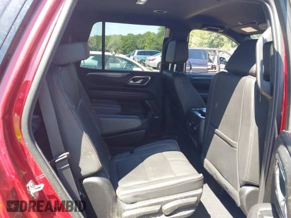 2023 Chevrolet Tahoe RST with VIN 1GNSCRKD9PR557300, listed as a IAAI auction lot 43087991 with 46,594 mi miles and . Bid and sale history available at DreamBid. Image 8.