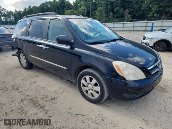 2007 Hyundai Entourage GLS with VIN KNDMC233476015019, listed as a Copart auction lot 69093035 with 226,655 mi miles and Salvage title. Bid and sale history available at DreamBid. Image 4.