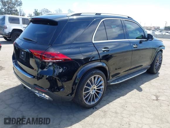 2023 Mercedes-Benz GLE 350 with VIN 4JGFB4JB1PA959788, listed as a IAAI auction lot 42013164 with 31,656 mi miles and . Bid and sale history available at DreamBid. Image 4.