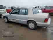 1993 Dodge Spirit with VIN 3B3XA4632PT520185, listed as a Copart auction lot 54891565 with 125,574 mi miles and Salvage title. Bid and sale history available at DreamBid. Image 2.
